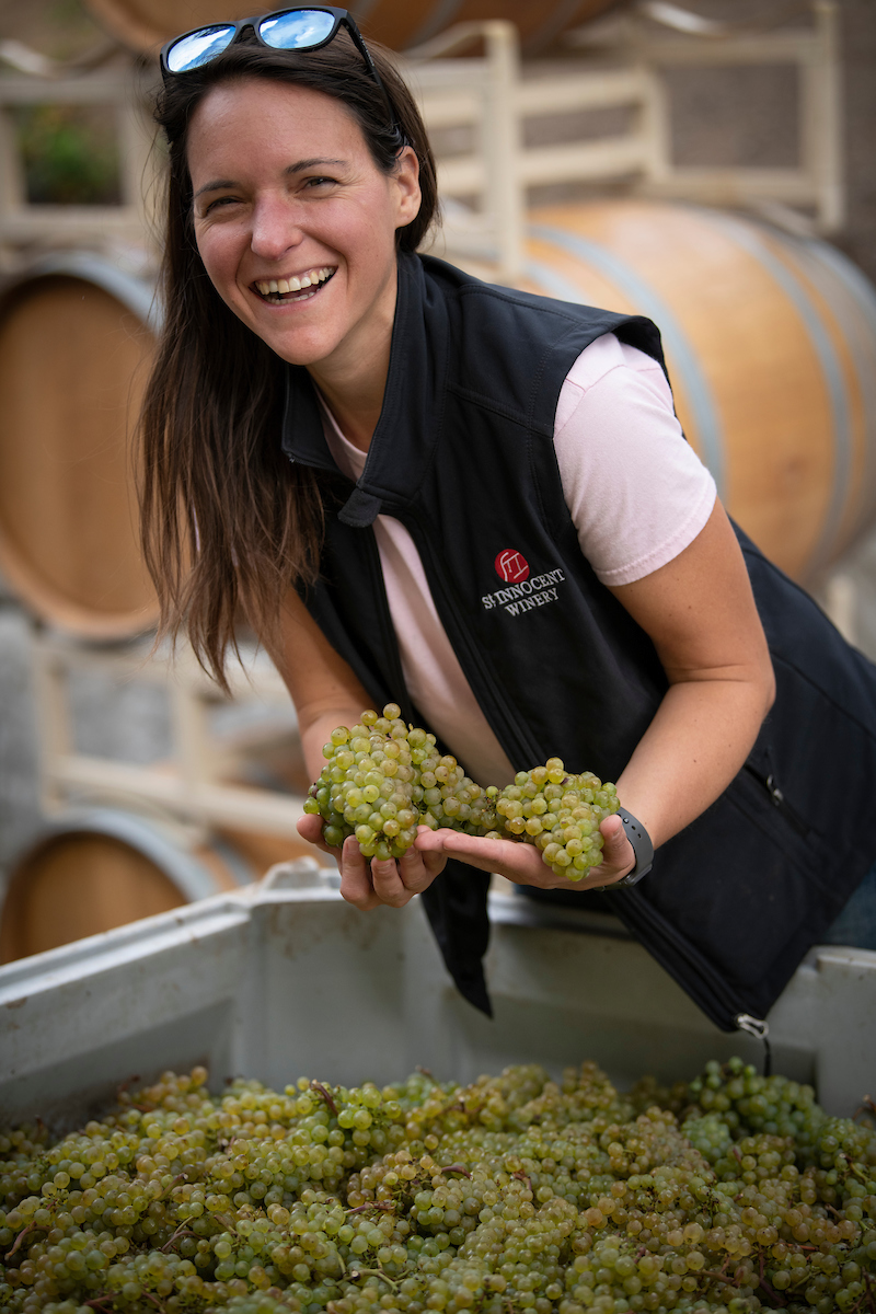 Alana Fontaine holding grapes Alana Fontaine holding grapes